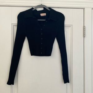 Urban Outfitters black ribbed sweater. NWT